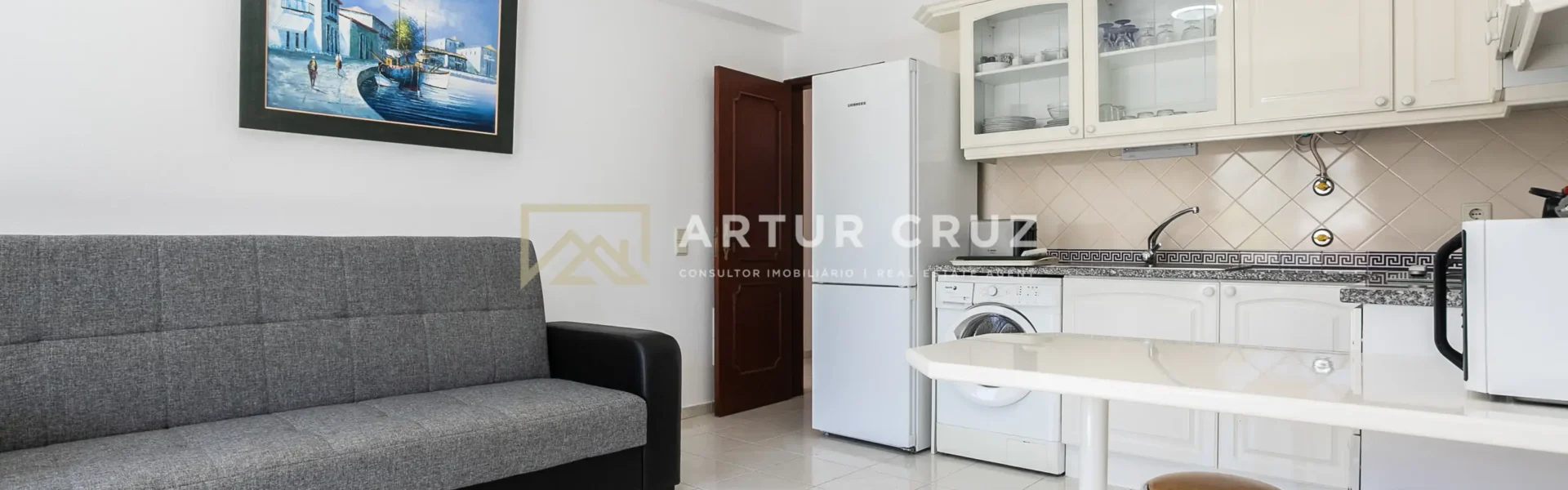 Sala com cozinha aberta, T2 Cabanas Village